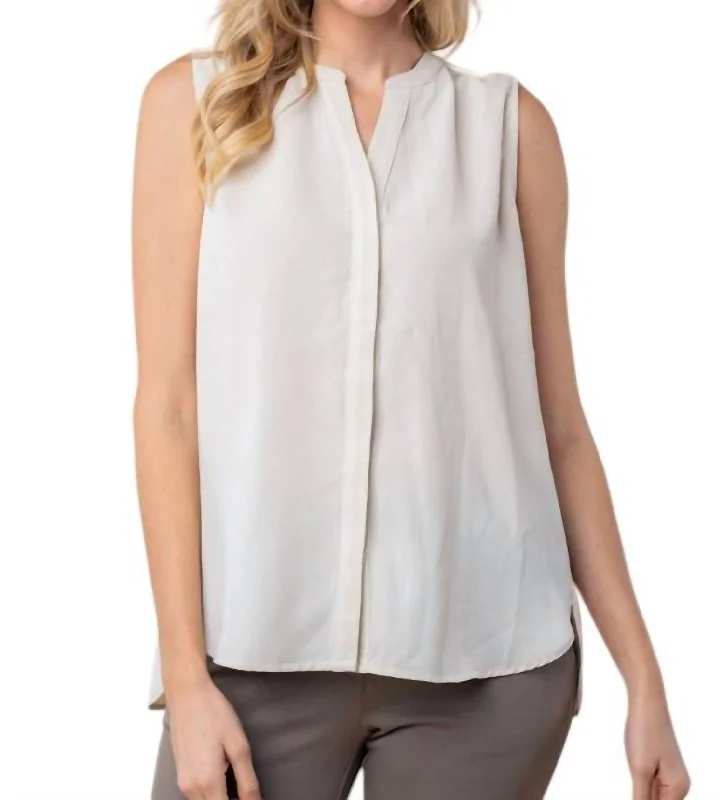 Trend Setting Threads Sleeveless Solid Woven Top In Cream